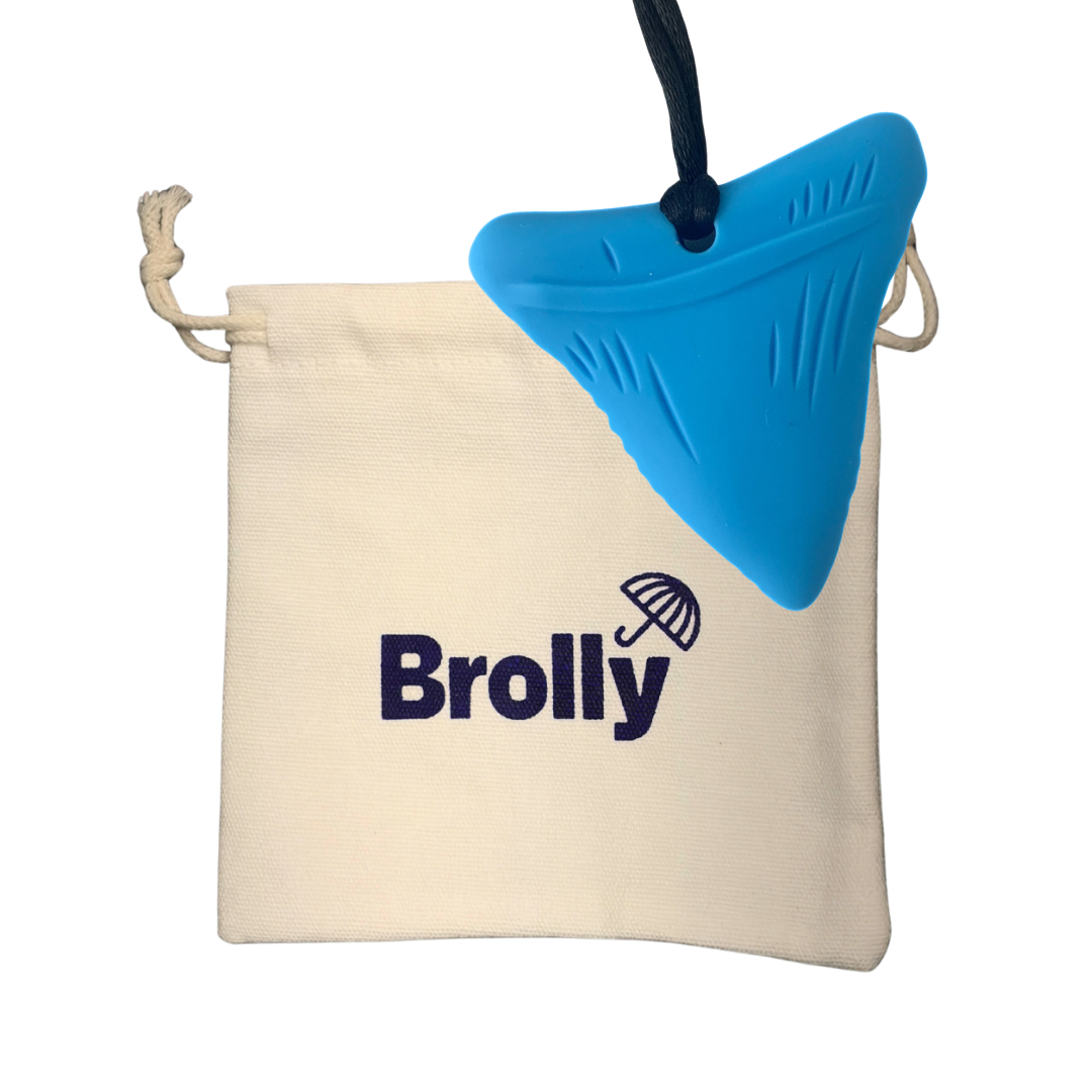 Beige drawstring pouch and Shark Tooth-shaped Brolly Chew Necklace on a black cord against a white background - Blue