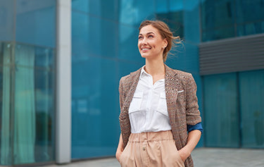 Women smile and looking up to the sky happy.