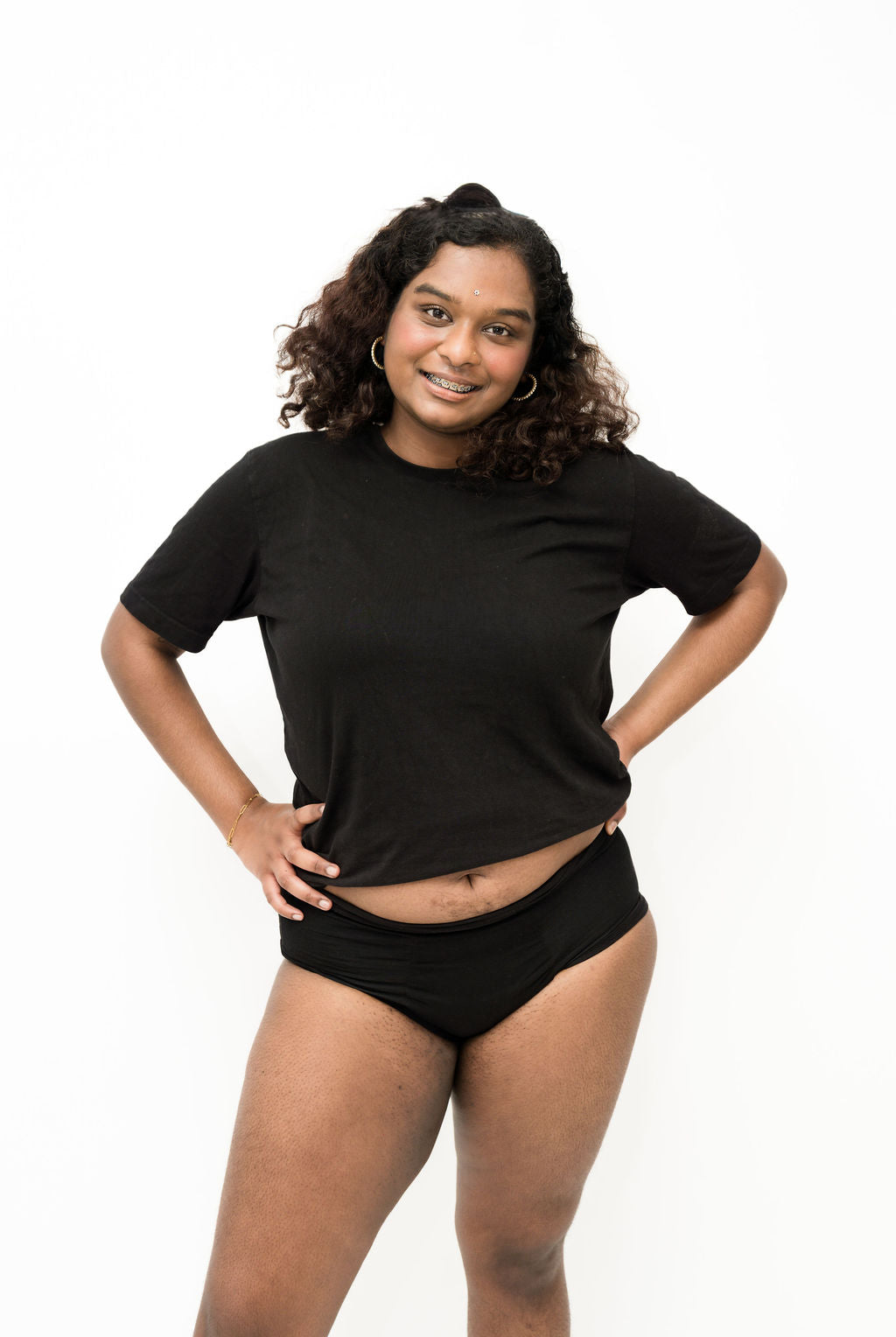Person wearing a black t-shirt and black Brolly underwear on a white background - Black
