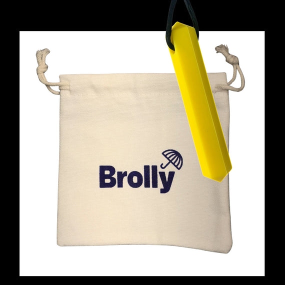 Beige drawstring pouch and Shark Tooth-shaped Brolly Chew Necklace on a black cord against a white background - Blue