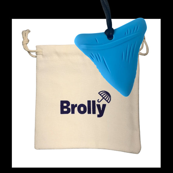 Beige drawstring pouch and Shark Tooth-shaped Brolly Chew Necklace on a black cord against a white background - Blue