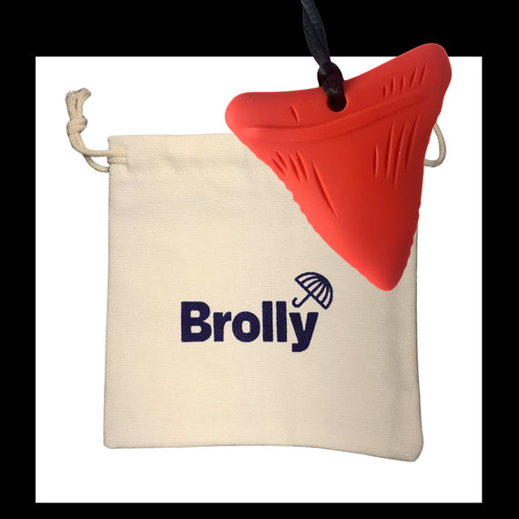 Beige drawstring pouch and Shark Tooth-shaped Brolly Chew Necklace on a black cord against a white background - Blue