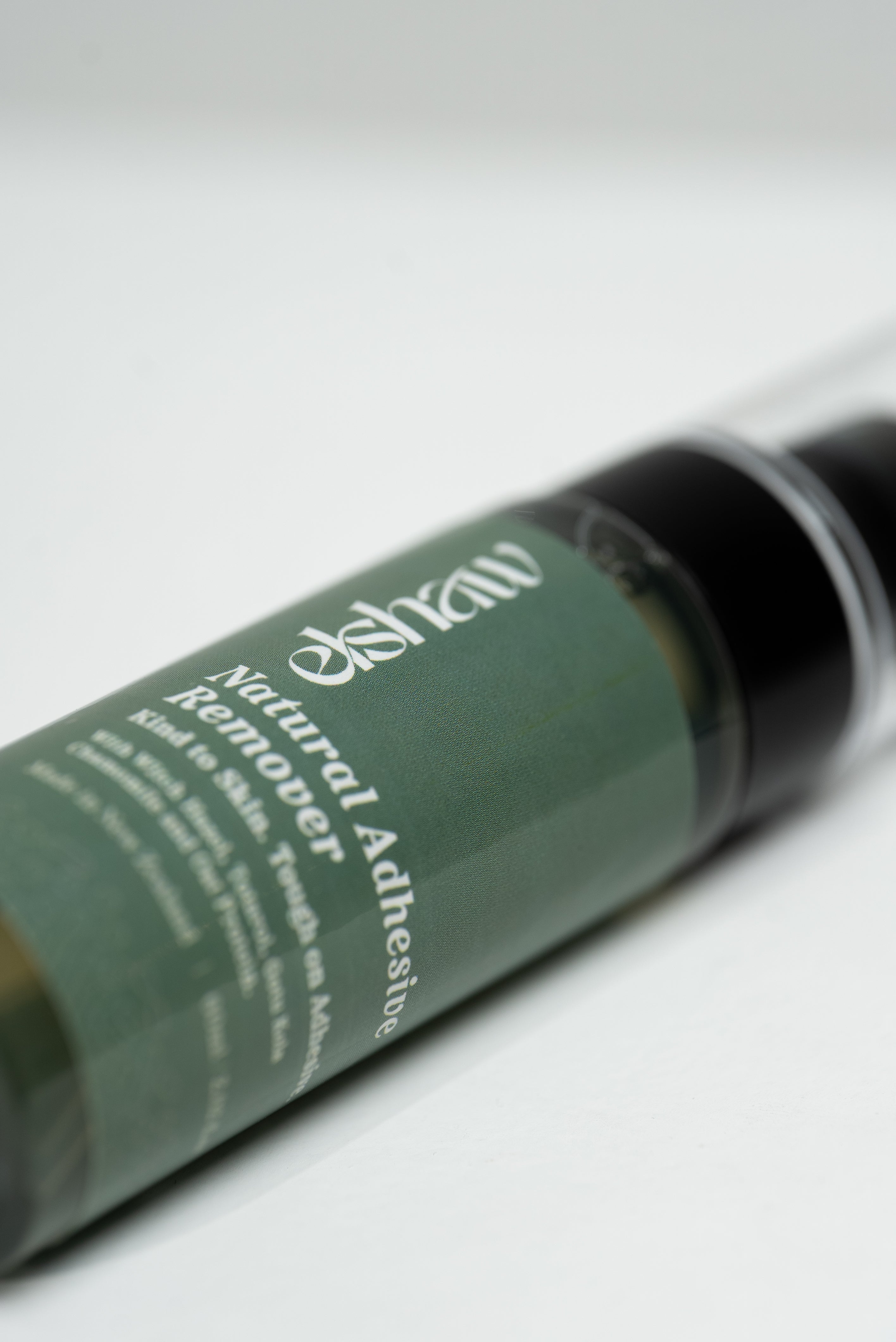 Angled view of Elshaw Natural Adhesive Remover 60ml spray bottle